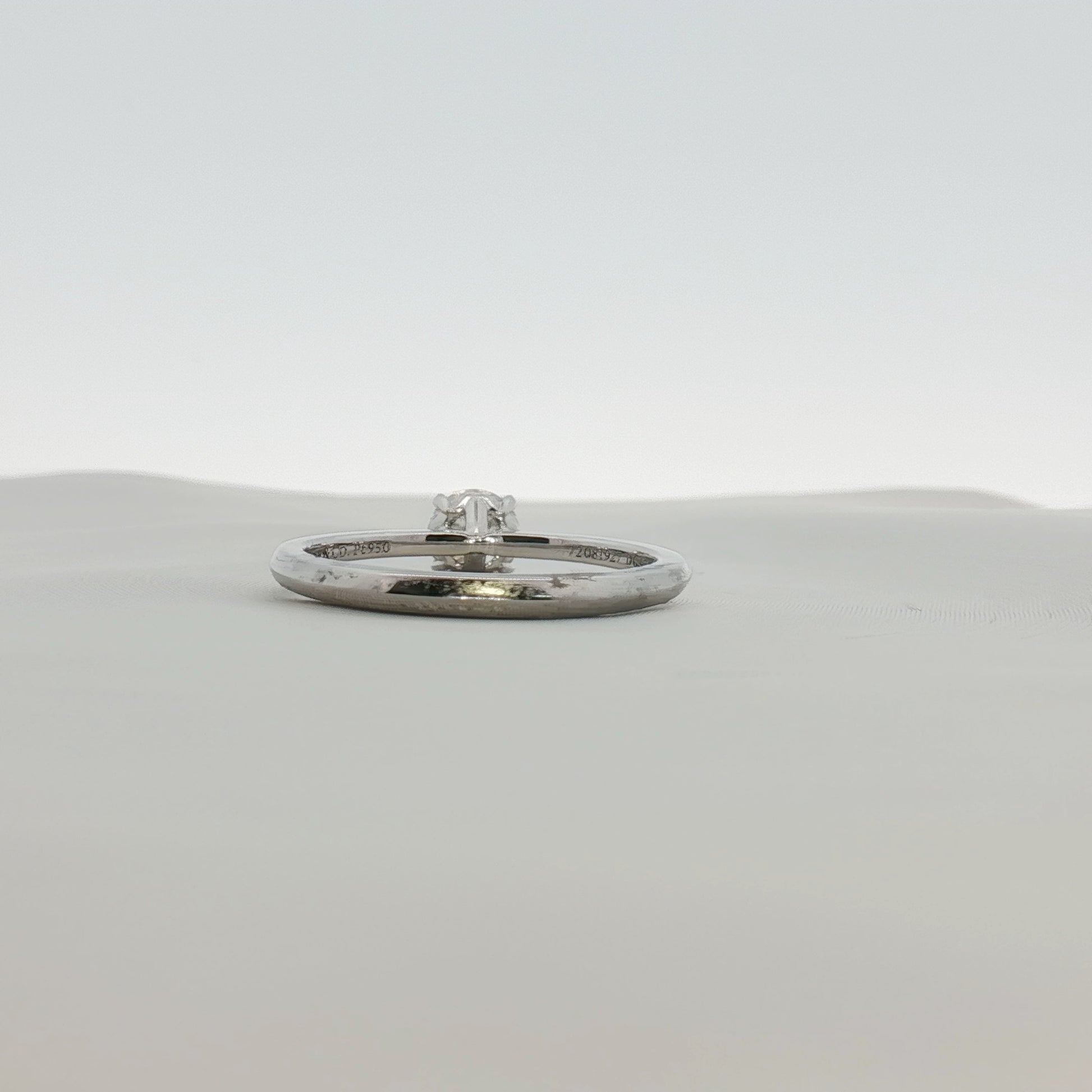 Gold & Beyond Tiffany & Co. True Engagement Ring jewelry featuring a stunning diamond solitaire in a classic setting.