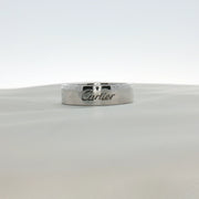 Cartier platinum wedding band ring with a sleek, polished finish, designed for elegant jewelry and wedding accessories.