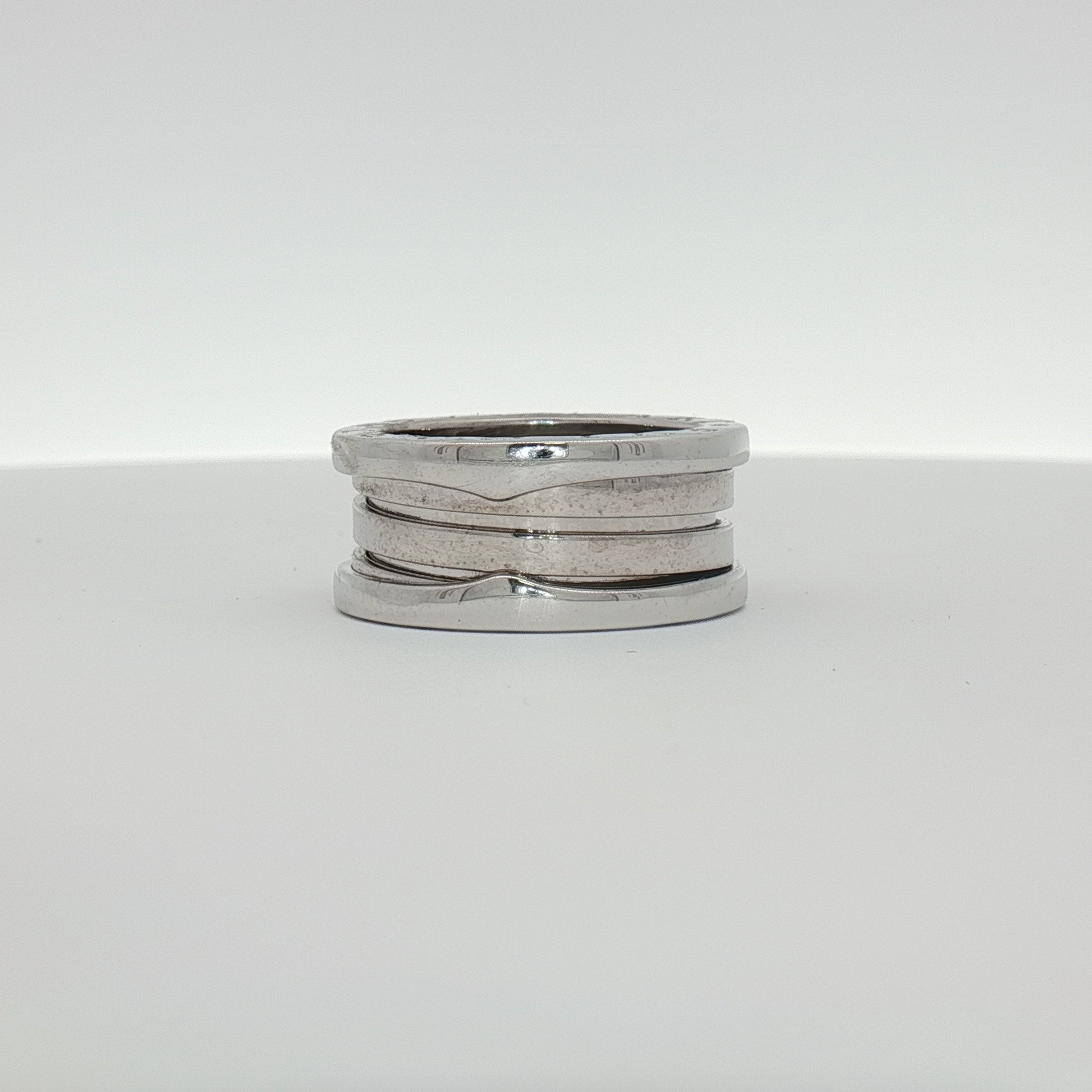 Gold & Beyond Bulgari B.Zero1 jewelry ring with a sleek design, featuring polished gold finish and distinctive band style.