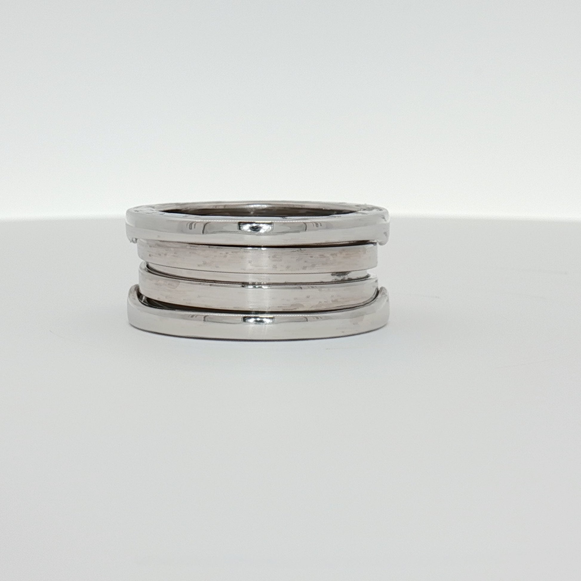 Gold & Beyond Bulgari B.Zero1 ring showcases sleek gold jewelry with a modern, distinctive design.