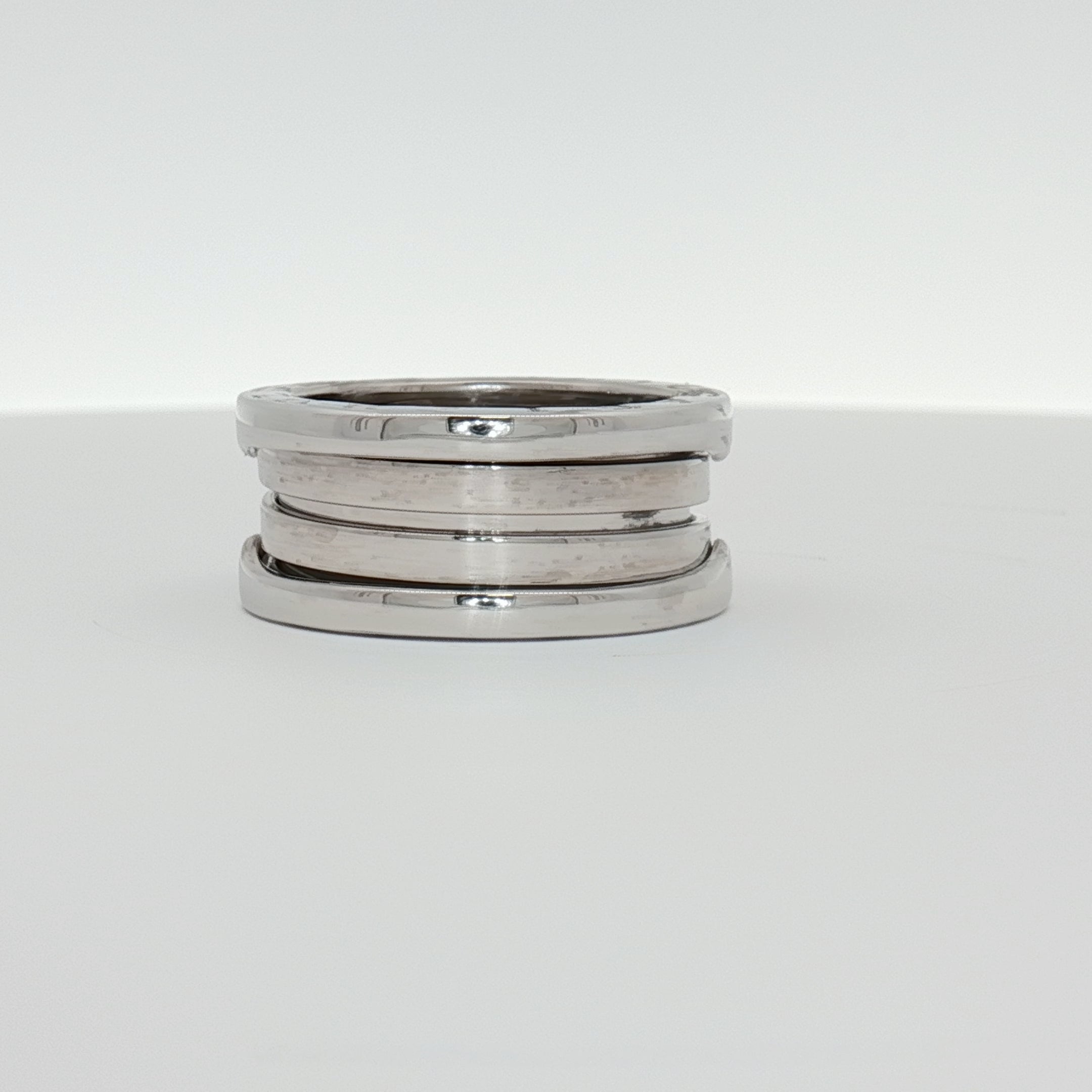 Gold & Beyond Bulgari B.Zero1 ring showcases sleek gold jewelry with a modern, distinctive design.