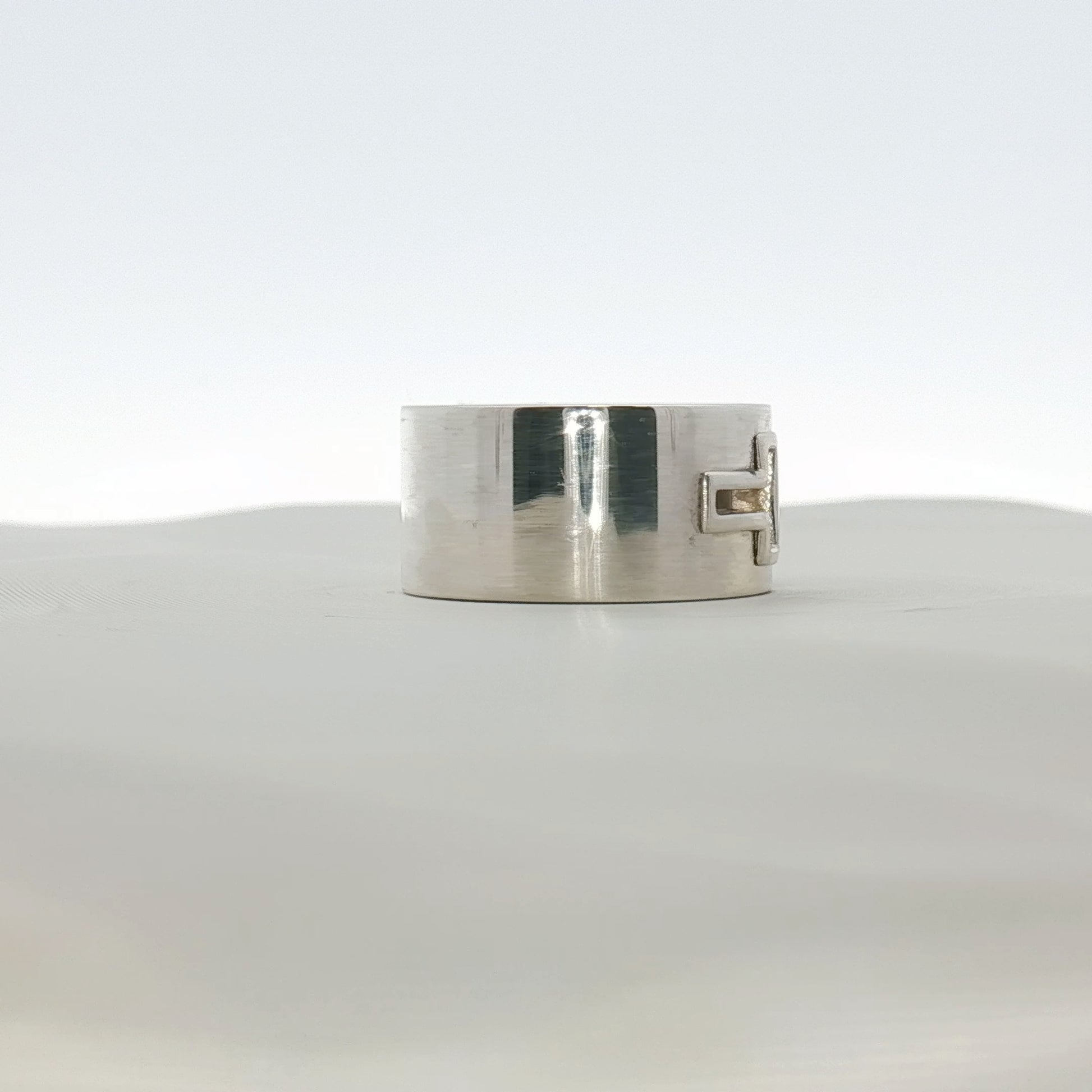 Gold & Beyond Tiffany & Co. T Wide Ring, a sleek gold jewelry piece with a wide band design.