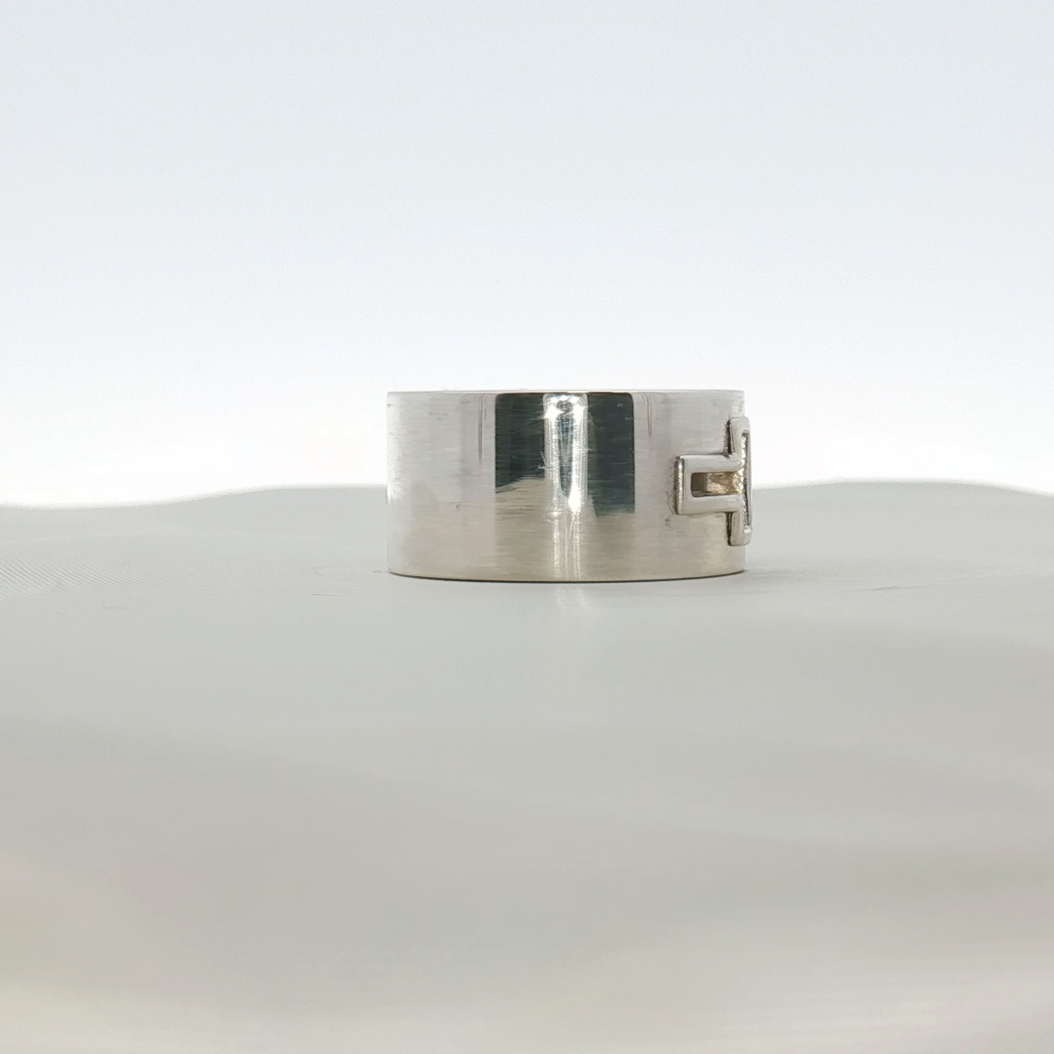 Gold & Beyond Tiffany & Co. T Wide Ring, a sleek gold jewelry piece with a wide band design.