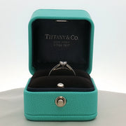 Gold & Beyond Tiffany & Co. Grace Princess Diamond Ring, elegant jewelry featuring a sparkling diamond centerpiece on a gold band.