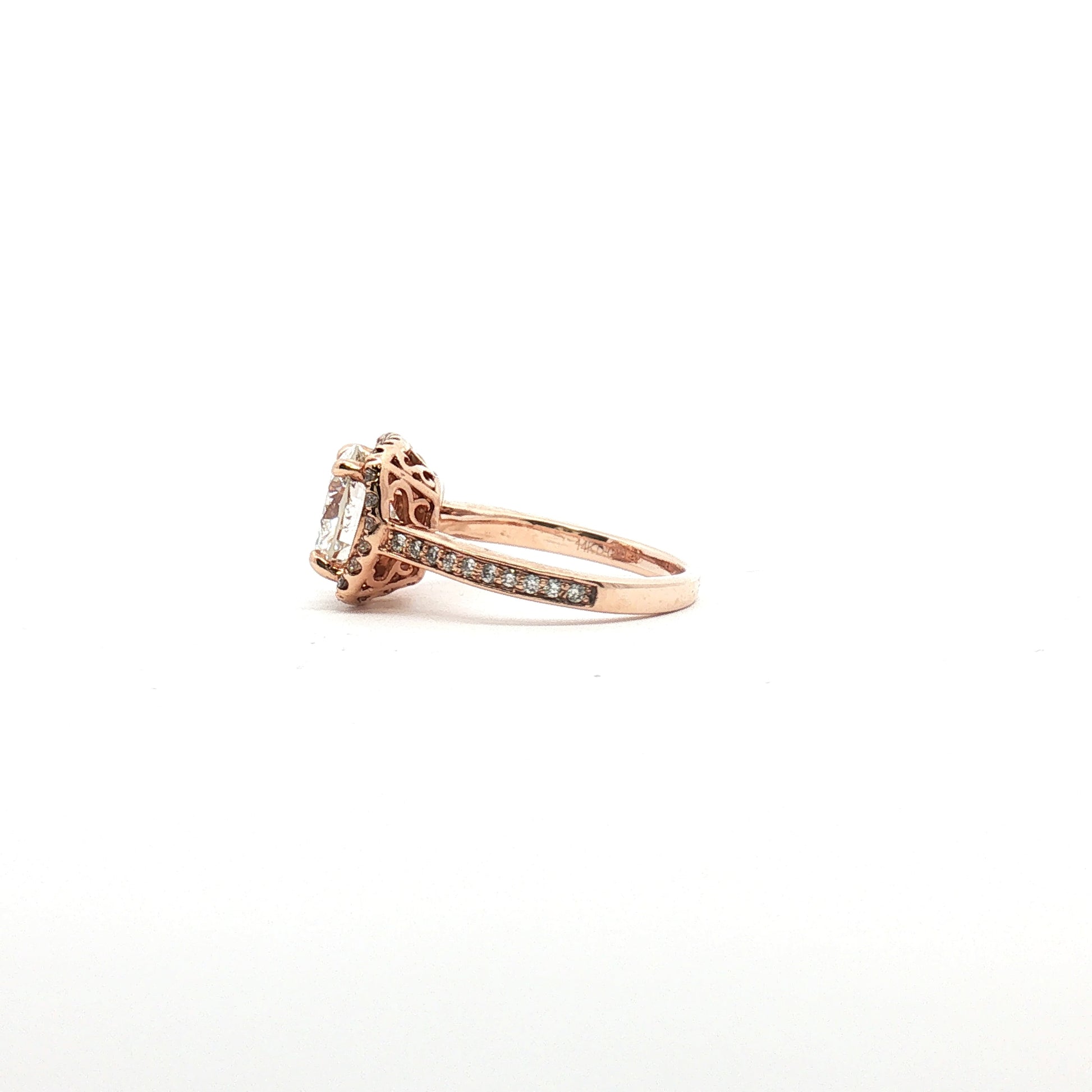 14K tri-color gold diamond halo ring with sparkling diamonds and intricate design, showcasing elegant jewelry craftsmanship.