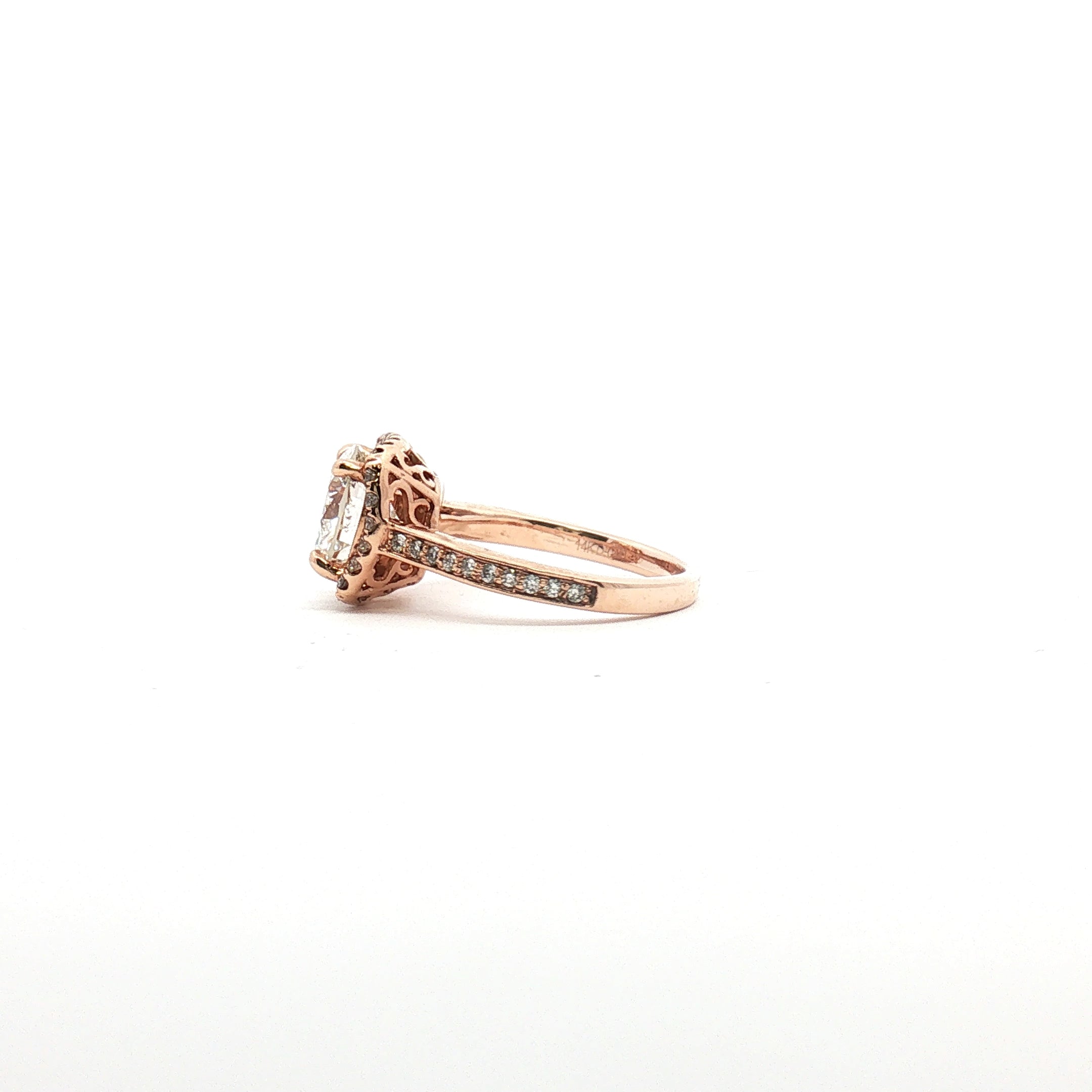 14K tri-color gold diamond halo ring with sparkling diamonds and intricate design, showcasing elegant jewelry craftsmanship.