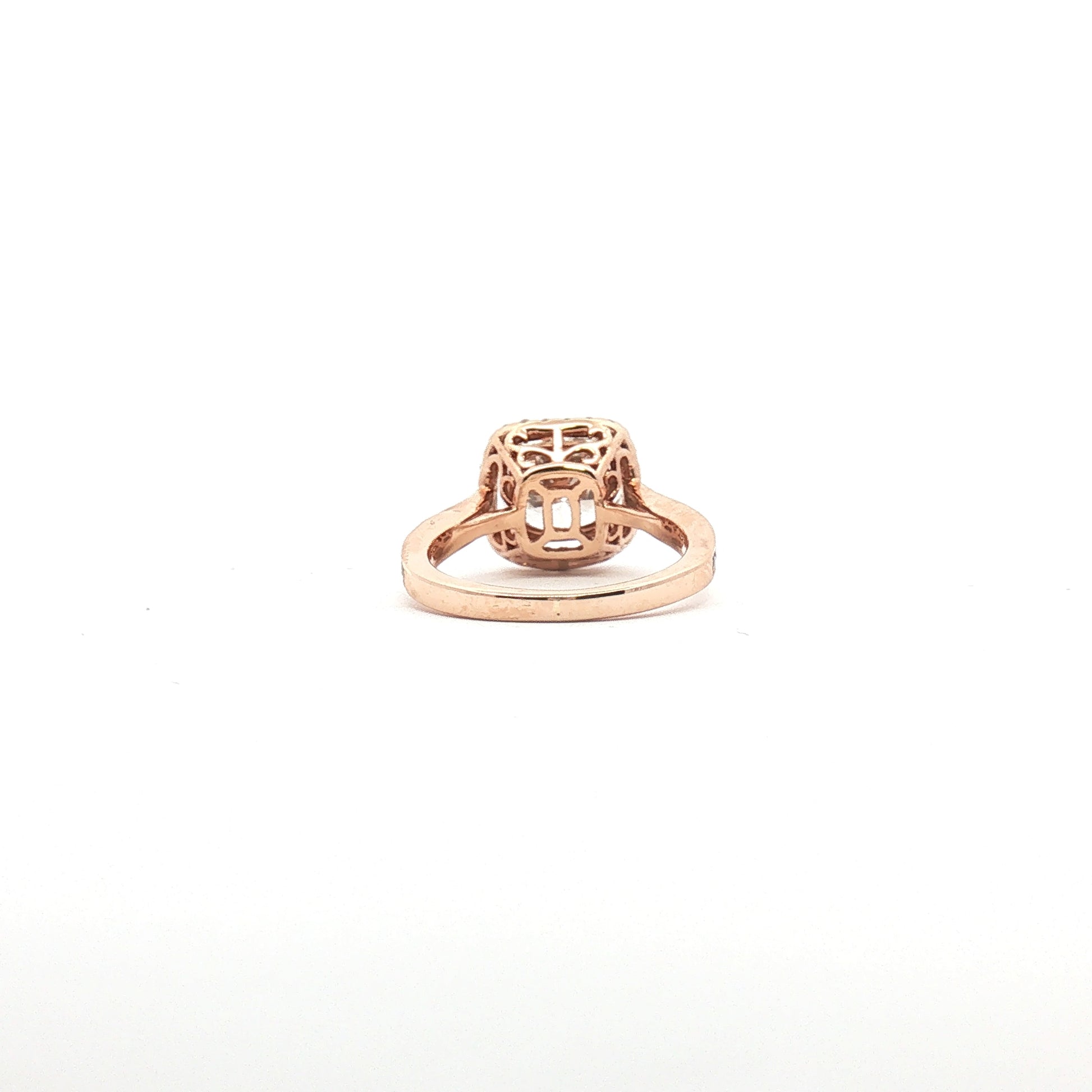 14K tri-color diamond halo ring from Gold & Beyond showcasing a sparkling diamond center with a colorful metal band.