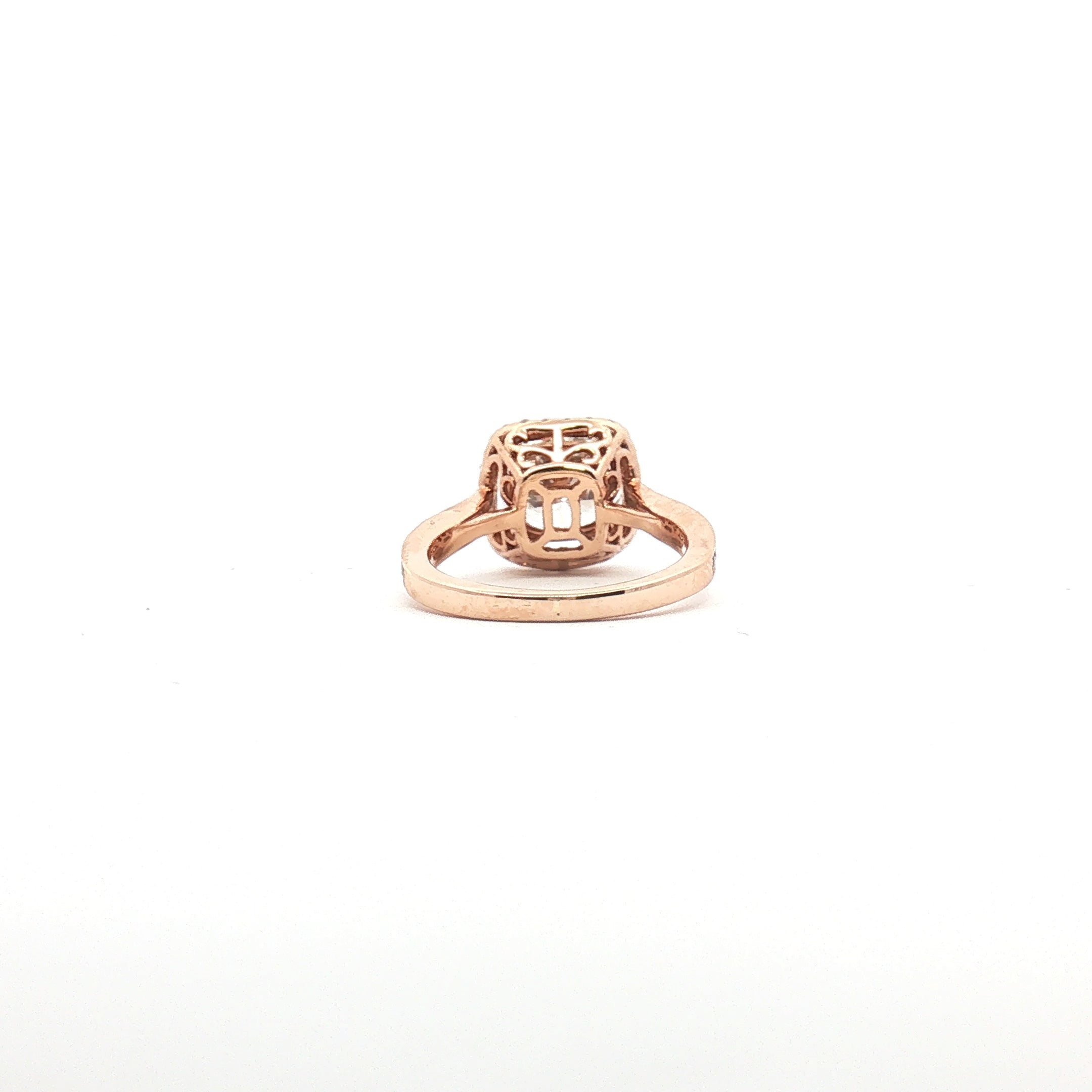 14K tri-color diamond halo ring from Gold & Beyond showcasing a sparkling diamond center with a colorful metal band.