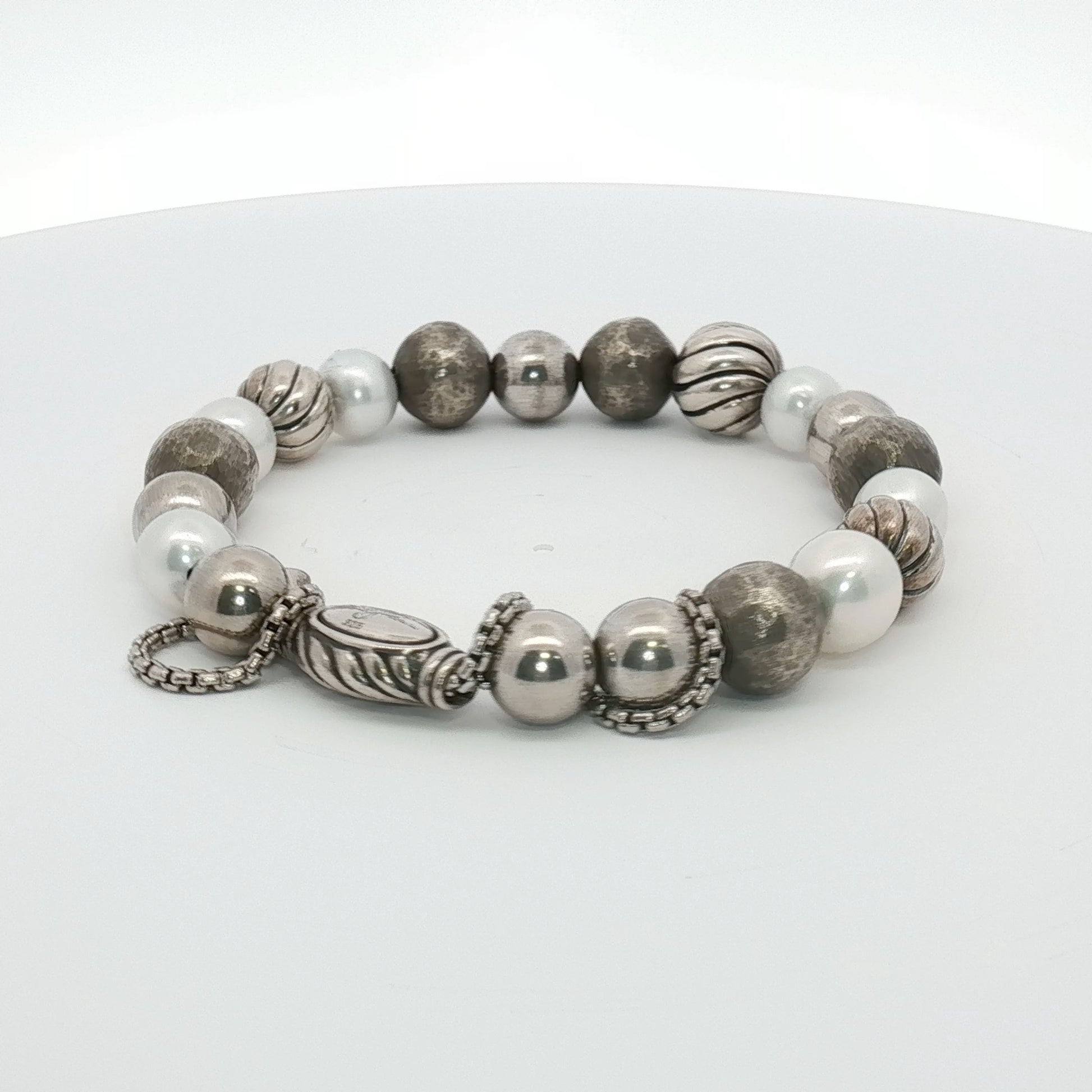 Sterling silver beaded bracelet by David Yurman featuring textured round beads, jewelry style, on a neutral background.