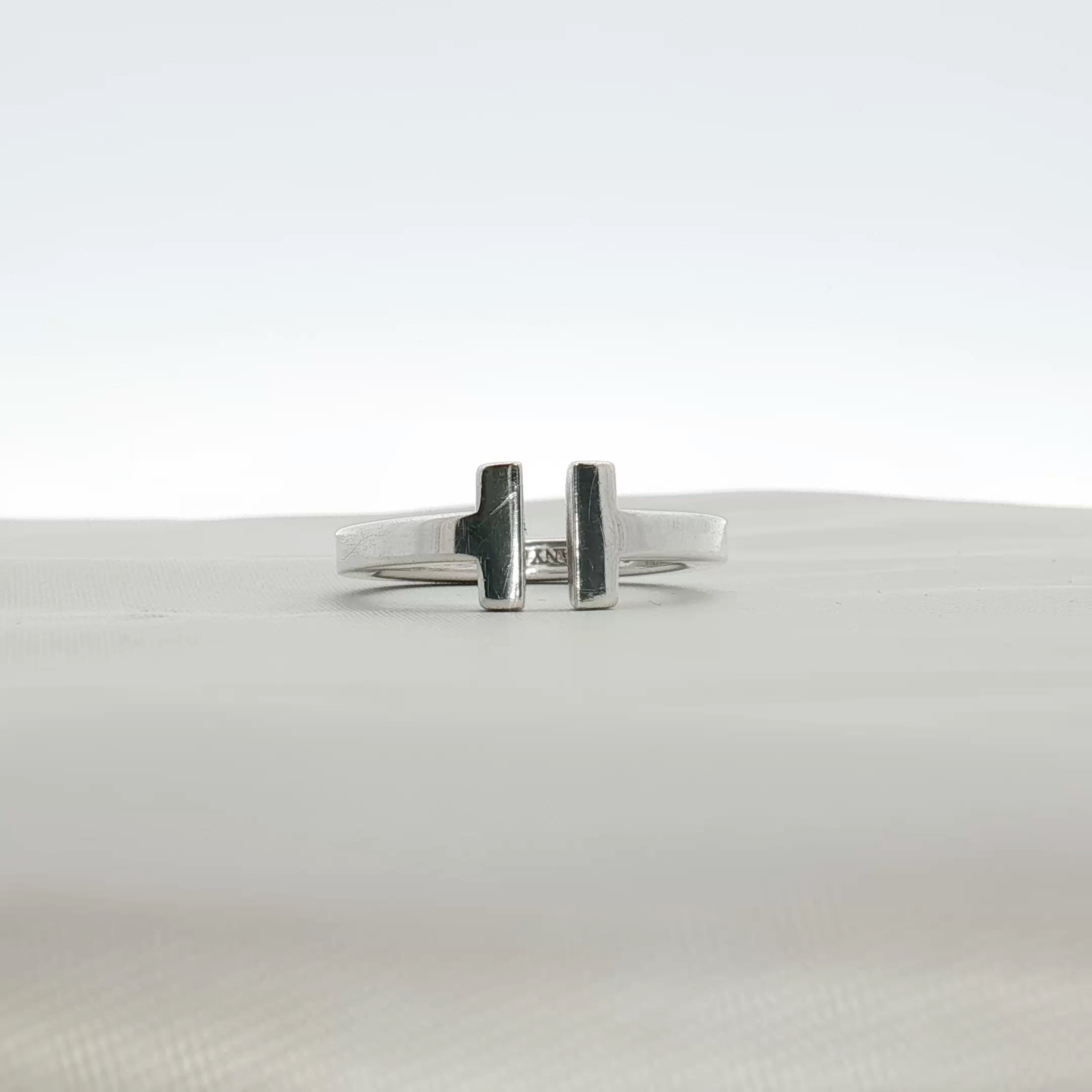 Gold & Beyond Tiffany & Co. T Open Ring jewelry featuring a sleek, modern gold design with the iconic T-shaped open style.