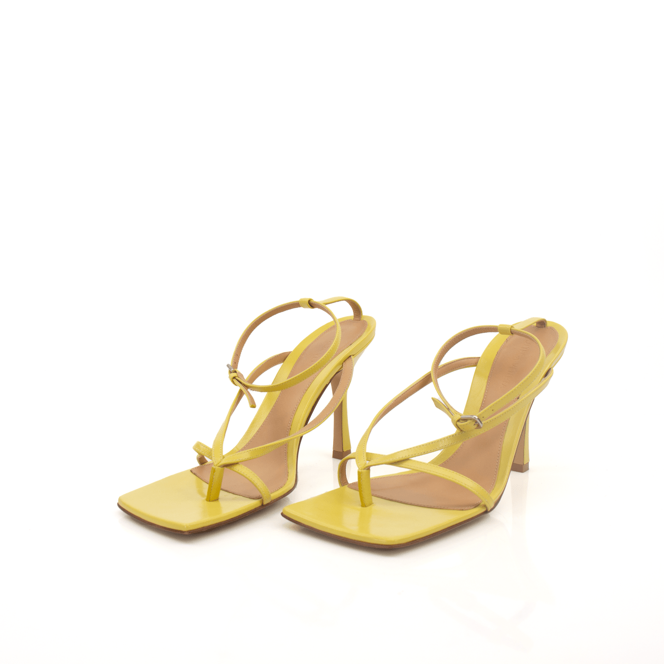 Yellow Bottega Veneta strap sandals with sleek design, featuring thin straps and a comfortable sole, by Gold & Beyond.