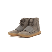 Adidas Yeezy Boost shoes in neutral tones with textured design, showcasing the stylish sneaker front view.