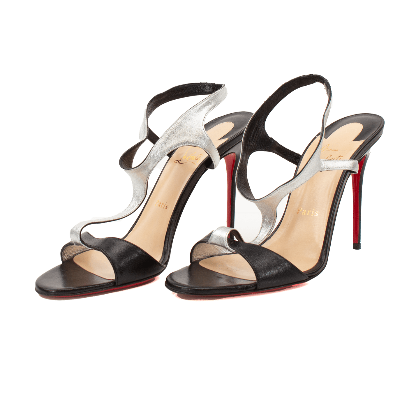 Christian Louboutin sandal pumps with high heels and signature red soles, displayed on a neutral background.