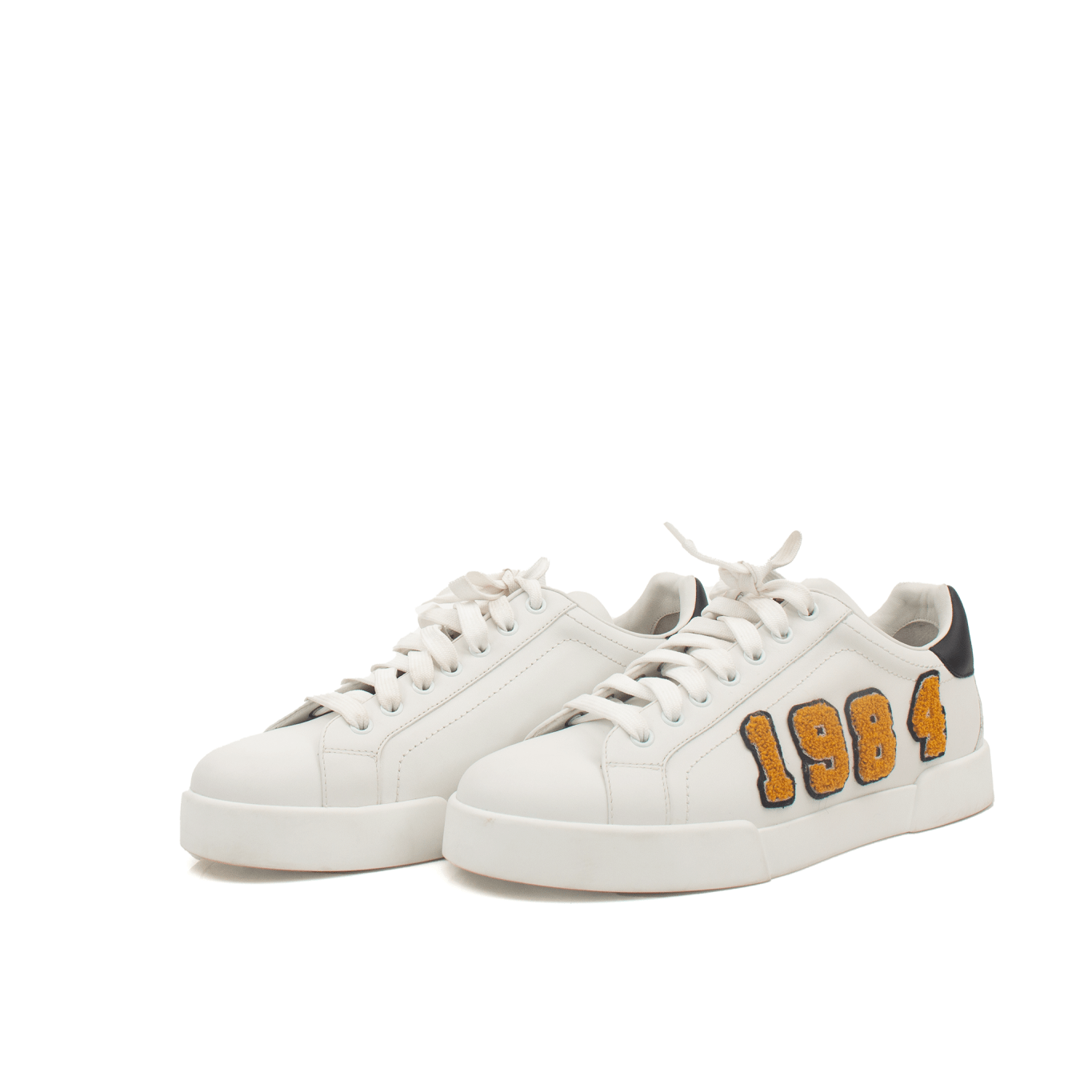 Gold & Beyond Dolce & Gabbana sneakers featuring stylish design, white and gold accents, and comfortable shoe construction.