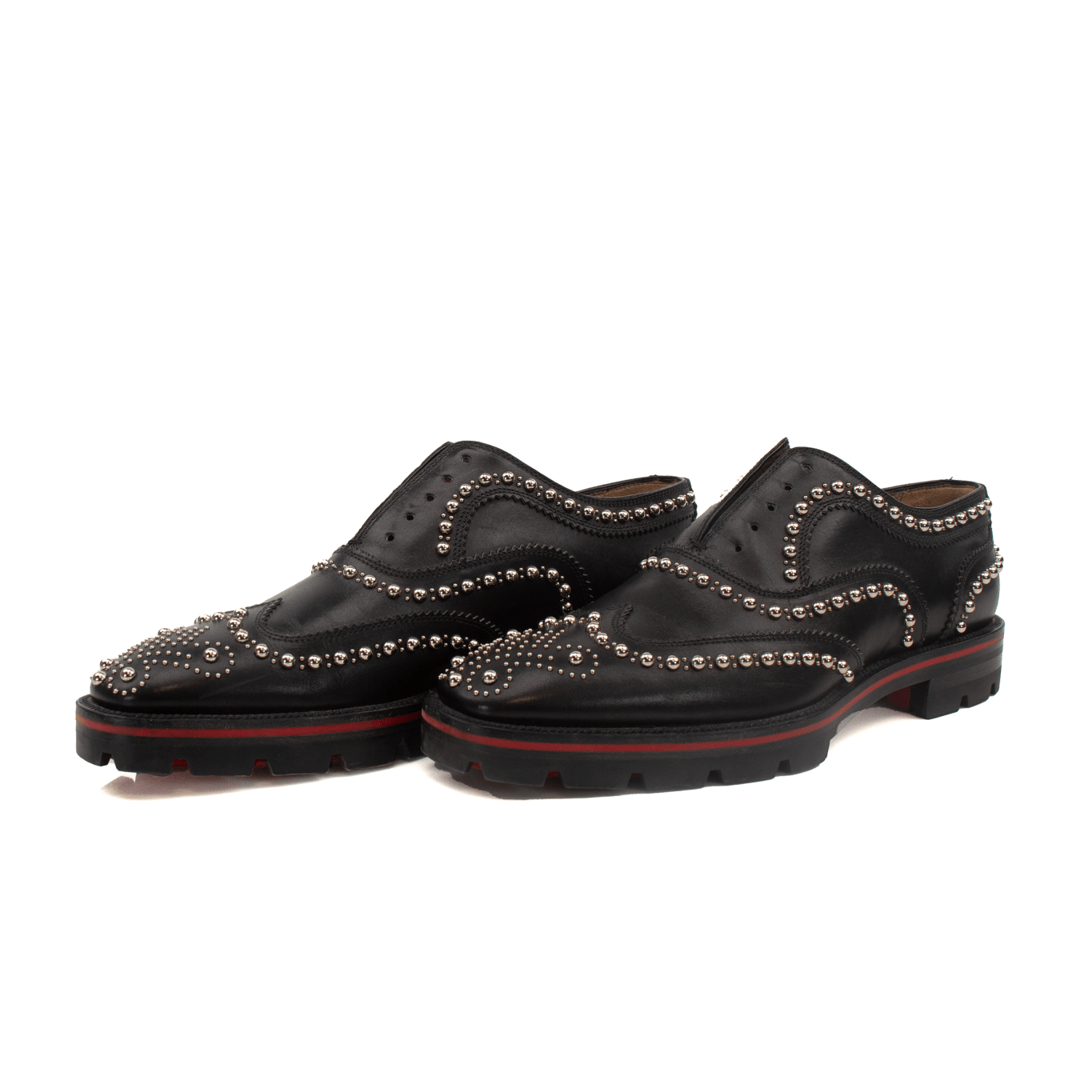 Christian Louboutin Charlie Studded Oxford shoes with black leather and gold-tone stud accents, stylish men's dress shoes.