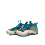 Nike Air Foamposite One “Weather Radar” shoes in black with a sleek, glossy finish and distinctive design details.