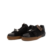 Dolce & Gabbana sneakers by Gold & Beyond, stylish shoes with bold design and intricate details, shown from side angle.