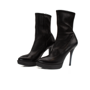 Gold & Beyond Gucci ankle boots, stylish leather shoes with sleek design and buckle accents, perfect for fashion-forward footwear.
