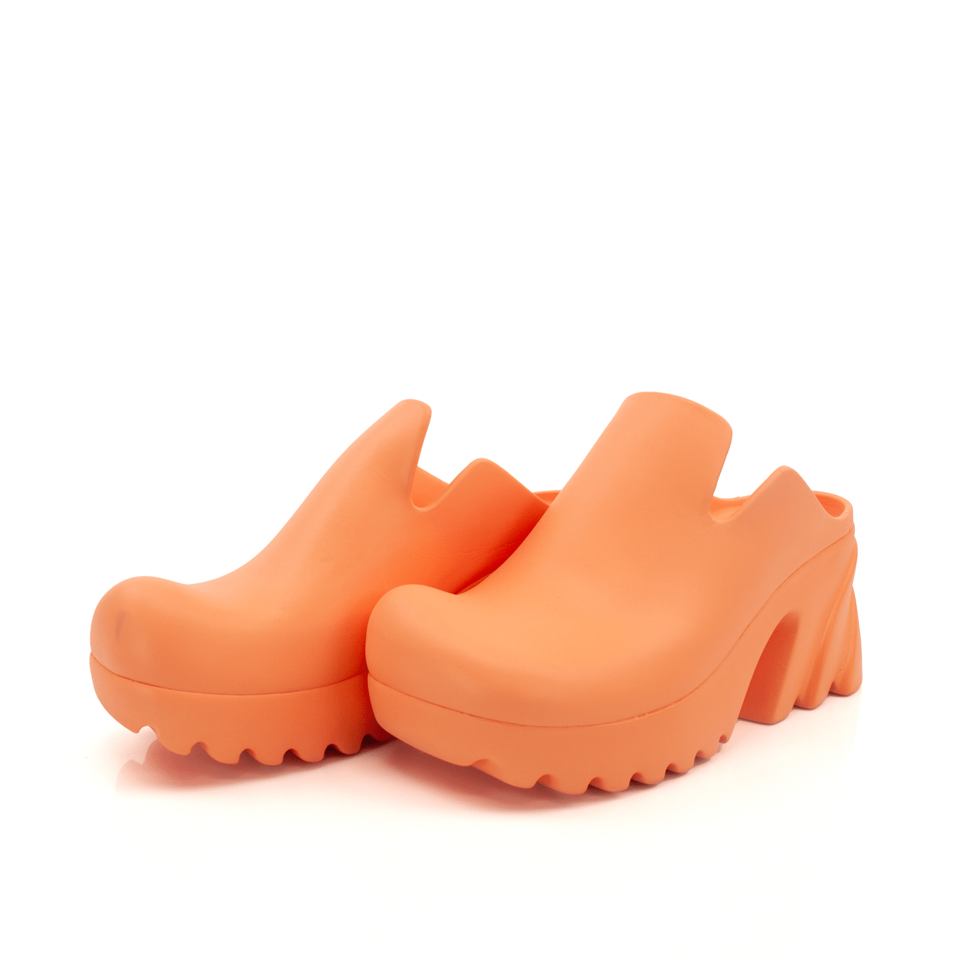 Orange rubber Bottega Veneta clogs shoes with a slip-on design, featuring a textured sole and stylish, vibrant appearance.