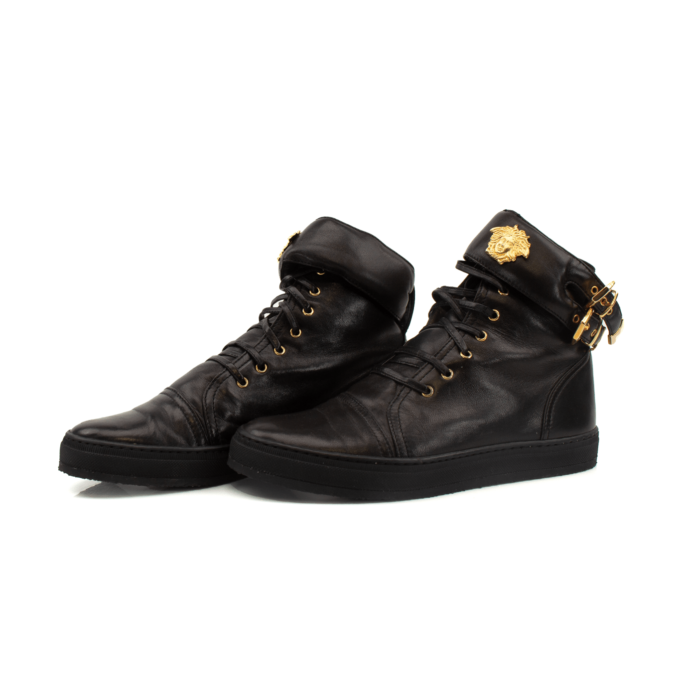 Gold & Beyond Versace Medusa Sneakers showing stylish shoes with Medusa logo and bold design in a close-up view.