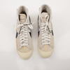 Nike x Off-White Blazer shoes in white with signature design details, displayed on a neutral background.