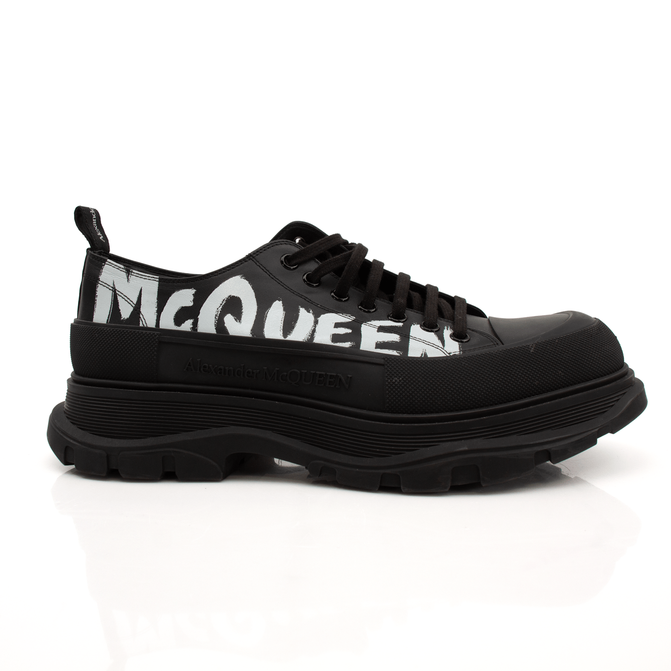 Gold & Beyond Alexander McQueen oversized sneakers with chunky white soles and designer branding, stylish and comfortable shoes.