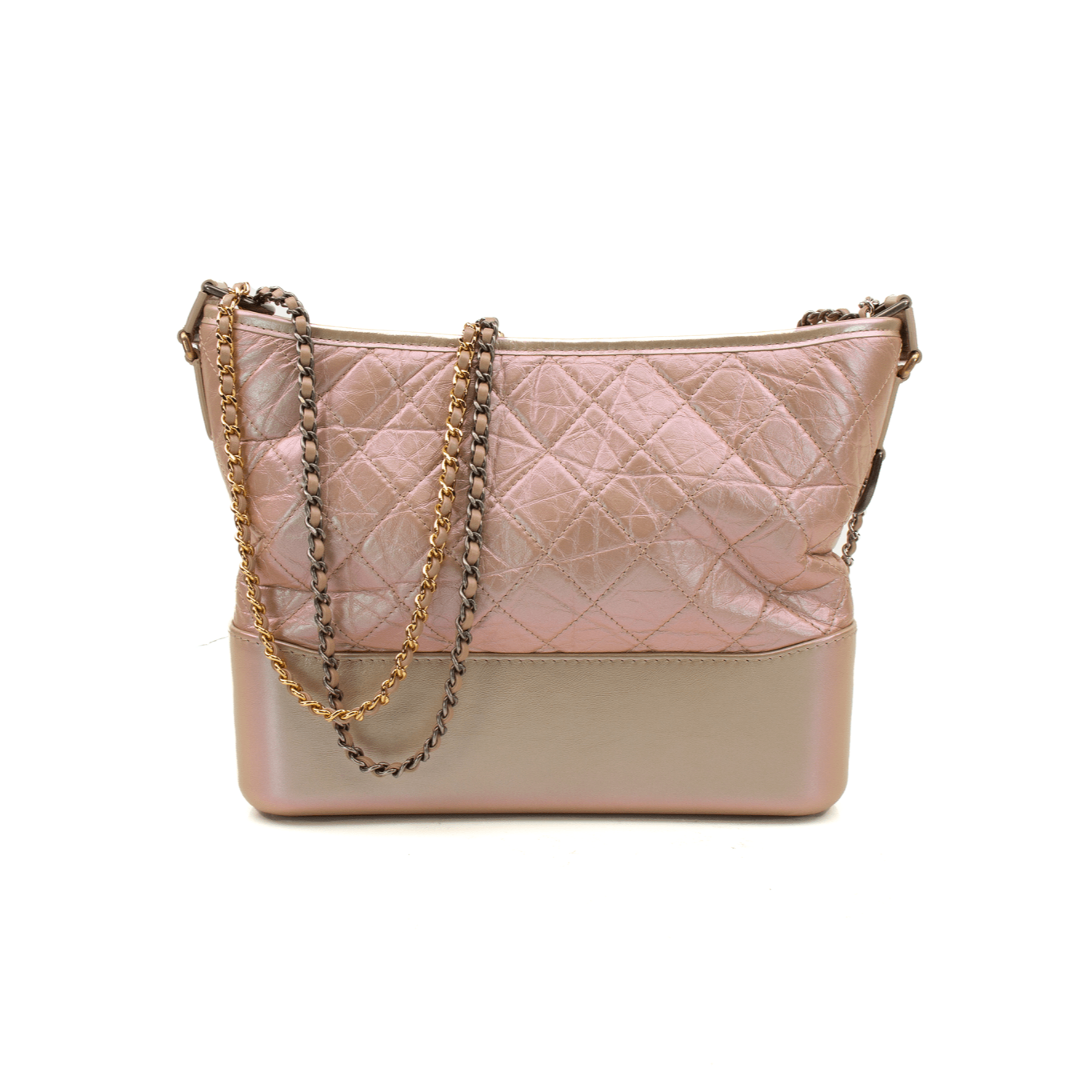 Chanel Gabrielle handbag in elegant design, featuring a quilted texture and gold-tone accents against a neutral backdrop.
