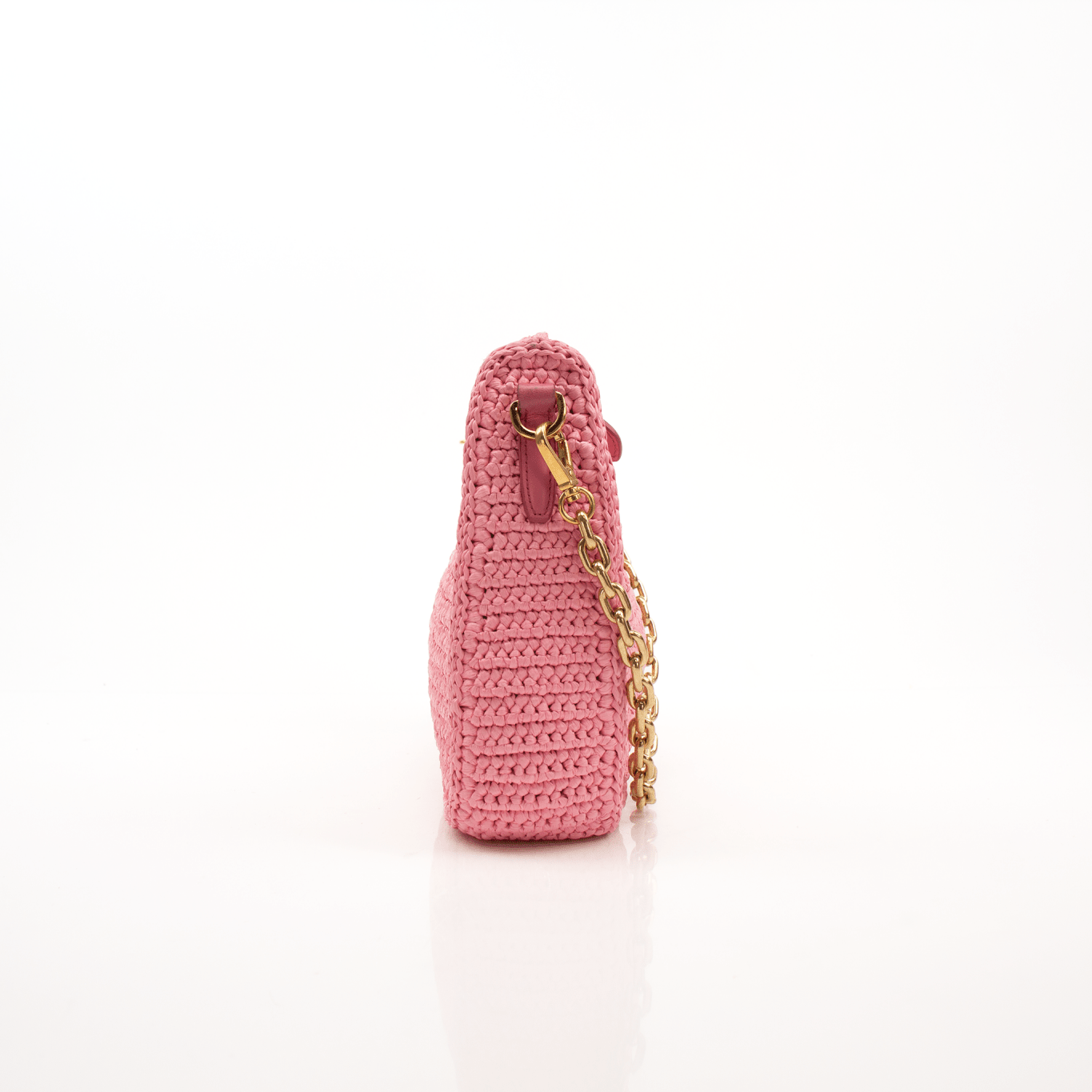 Pink Prada 2005 Re-Edition crochet handbag by Gold & Beyond, featuring a stylish woven design and elegant craftsmanship.