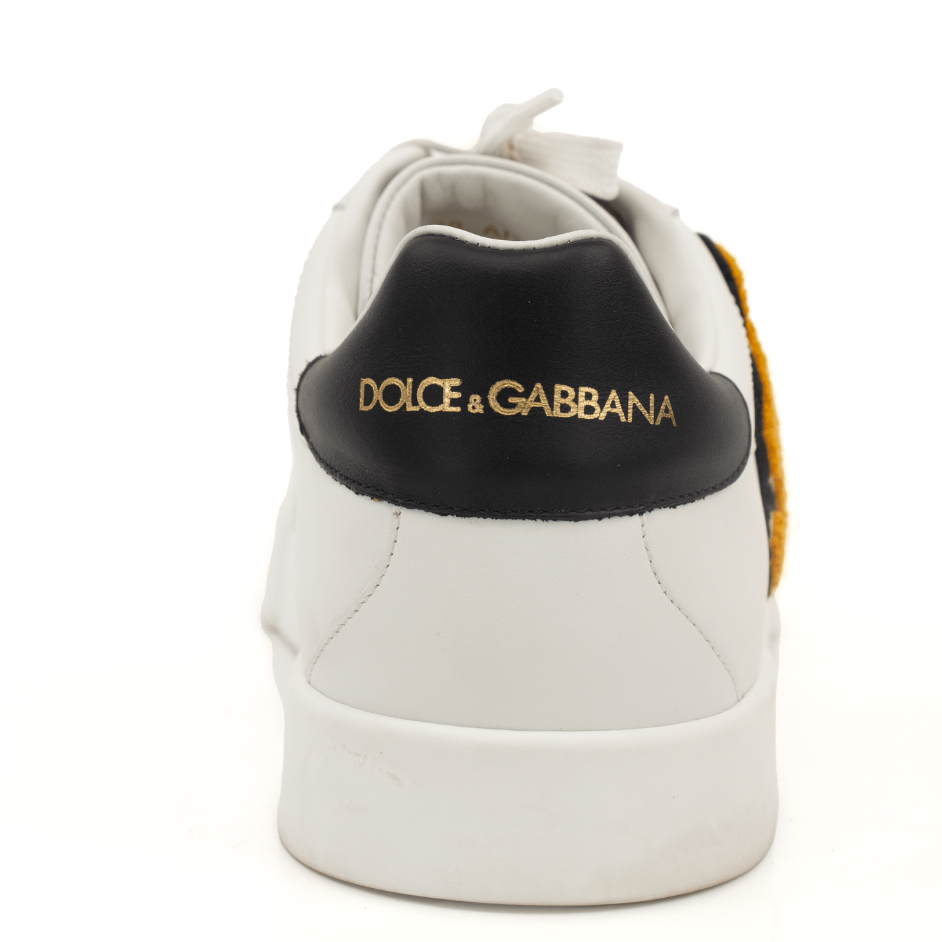 Gold & Beyond Dolce & Gabbana sneakers, stylish shoes with intricate design and vibrant color details, displayed on a clean background.
