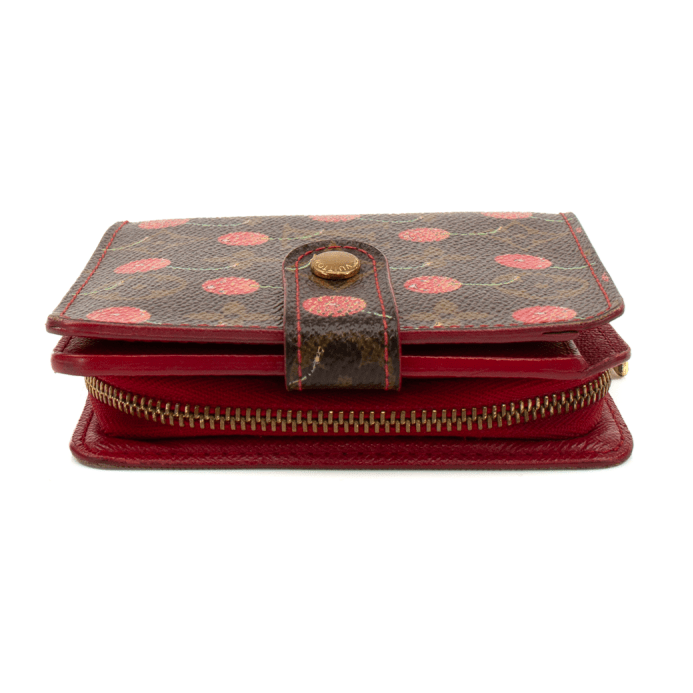 Louis Vuitton Cherry Cerise Zippy Wallet with zipper closure and monogram pattern, featuring multiple card slots and a spacious interior.