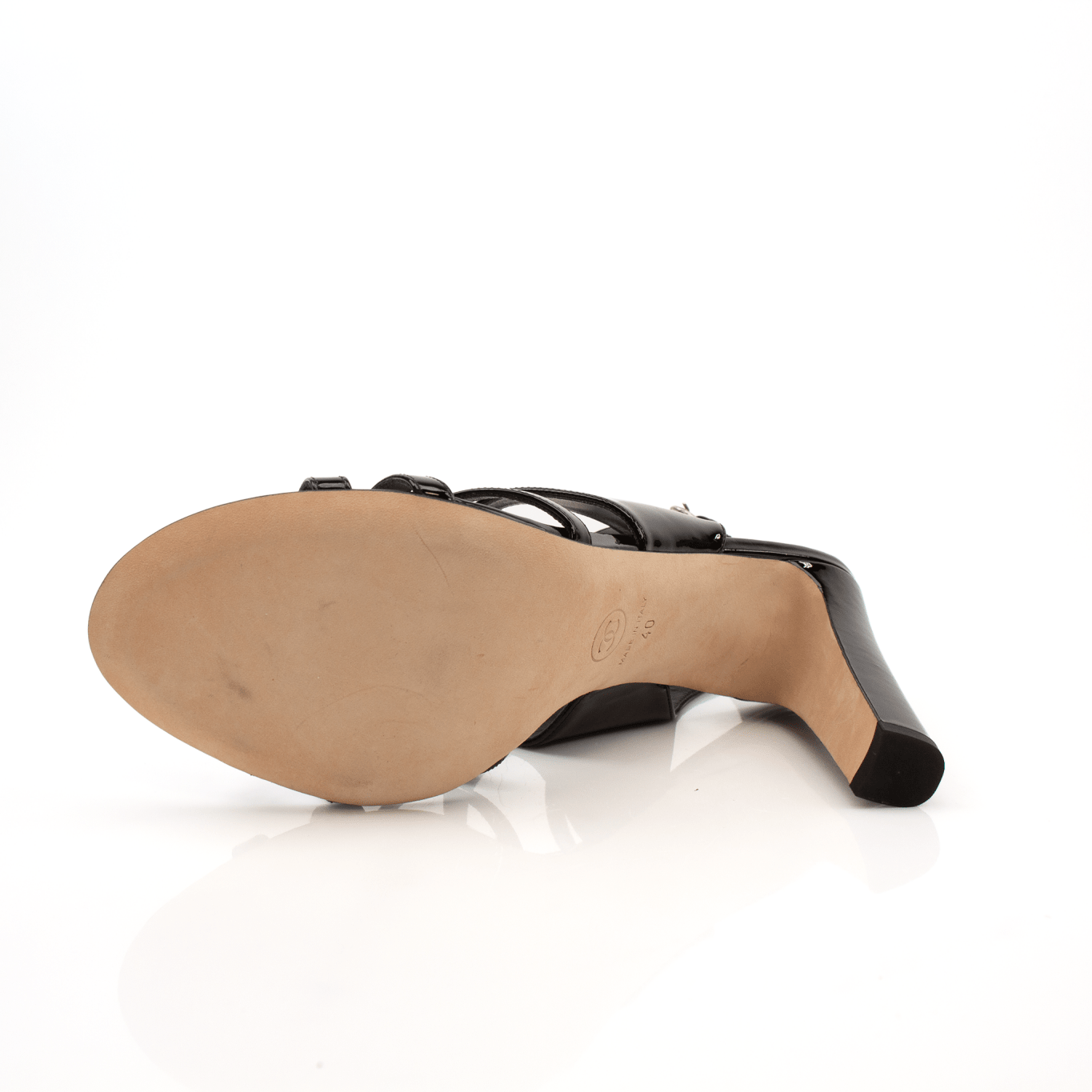 Gold & Beyond Chanel Camellia Flower Heel featuring a elegant floral design and stylish high heel for women.