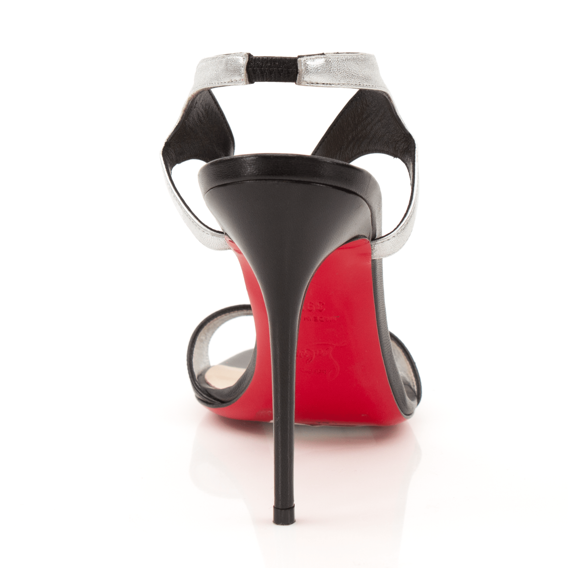 Christian Louboutin heel pumps in gold with signature red soles, stylish and elegant footwear for women.