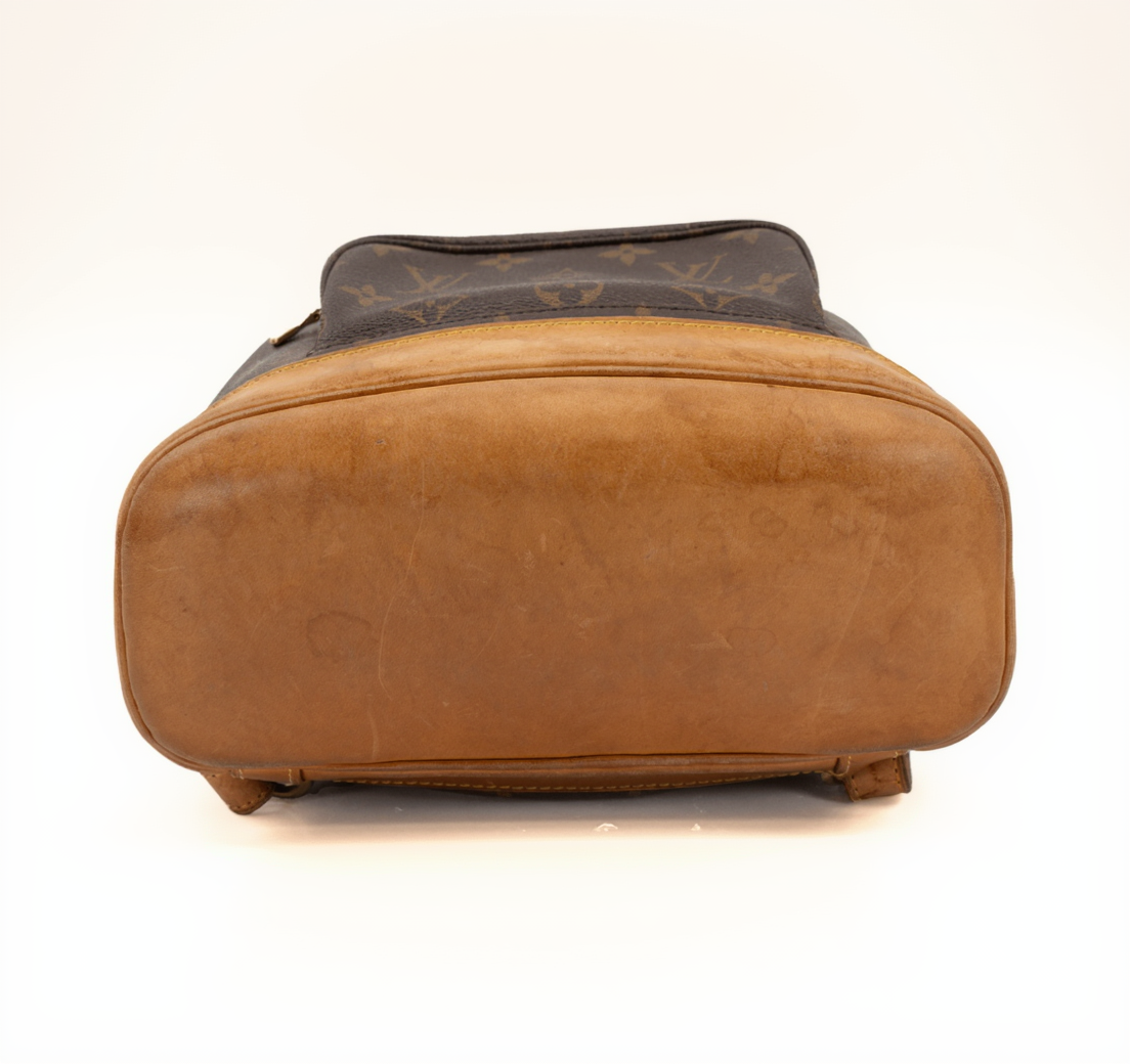 Louis Vuitton Montsouris Backpack for travel, featuring signature monogram canvas, leather straps, and spacious interior.