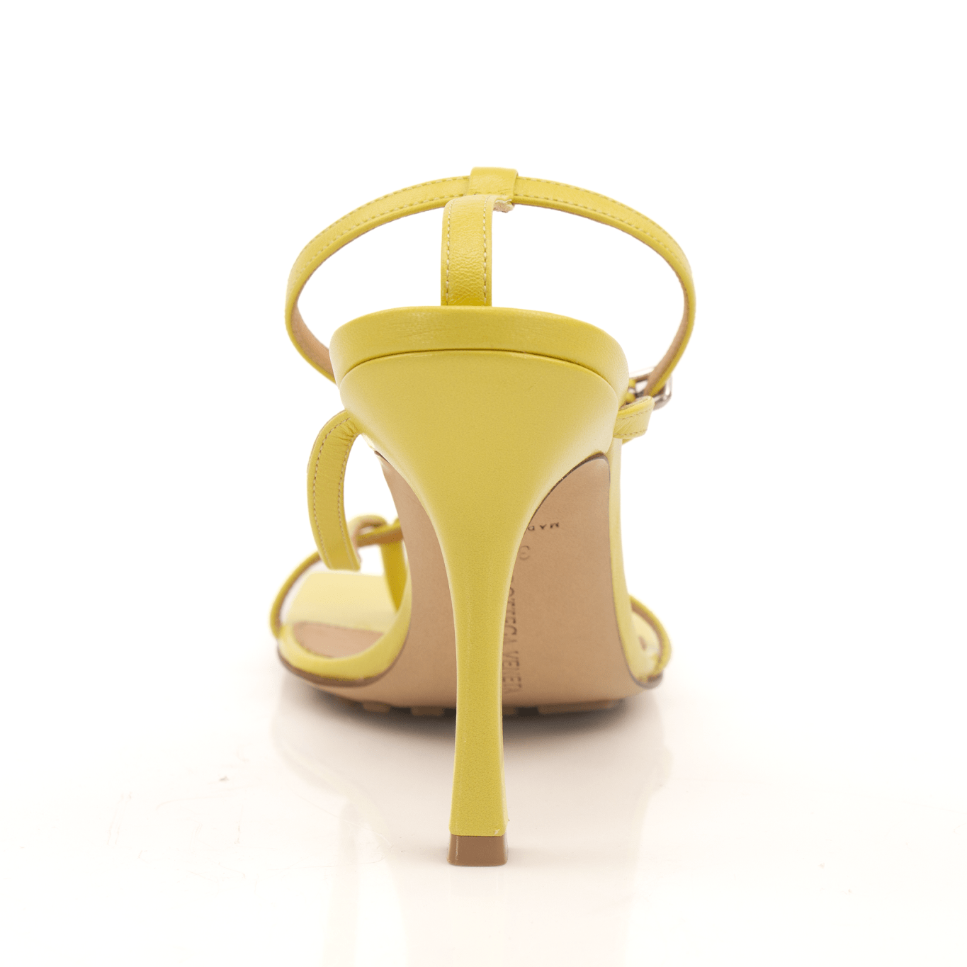Yellow Bottega Veneta strap sandals with sleek design, featuring gold accents and comfortable sole, perfect for stylish summer wear.