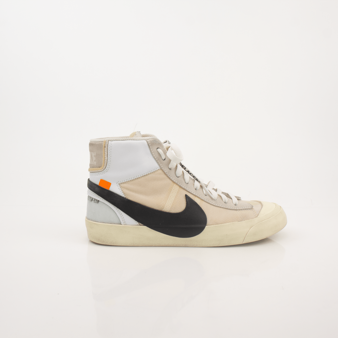 Nike x Off-White Blazer shoes featuring white leather and distinctive design details, displayed on a neutral background.