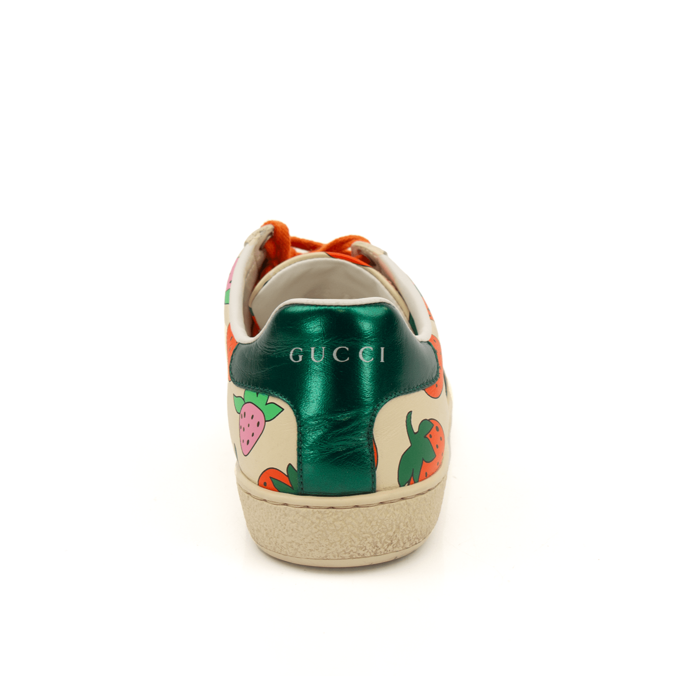 Gold & Beyond Gucci Strawberry Sneakers, stylish shoes with strawberry design, white soles, and colorful accents.