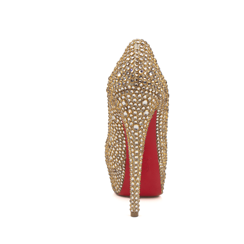 Christian Louboutin pumps in red with signature sole, stylish high-heeled shoes showcased on a neutral background.