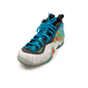 Nike Air Foamposite One Weather Radar shoes in metallic blue with black accents, featuring a sleek, futuristic design.