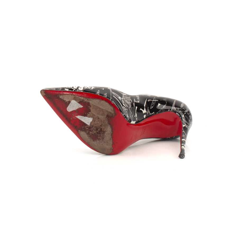 Gold & Beyond Louboutin Graphic Heels featuring bold, colorful designs on stylish high-heeled shoes.
