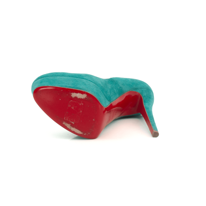 Gold & Beyond turquoise heels featuring sleek design and pointed toes, perfect for elegant occasions.