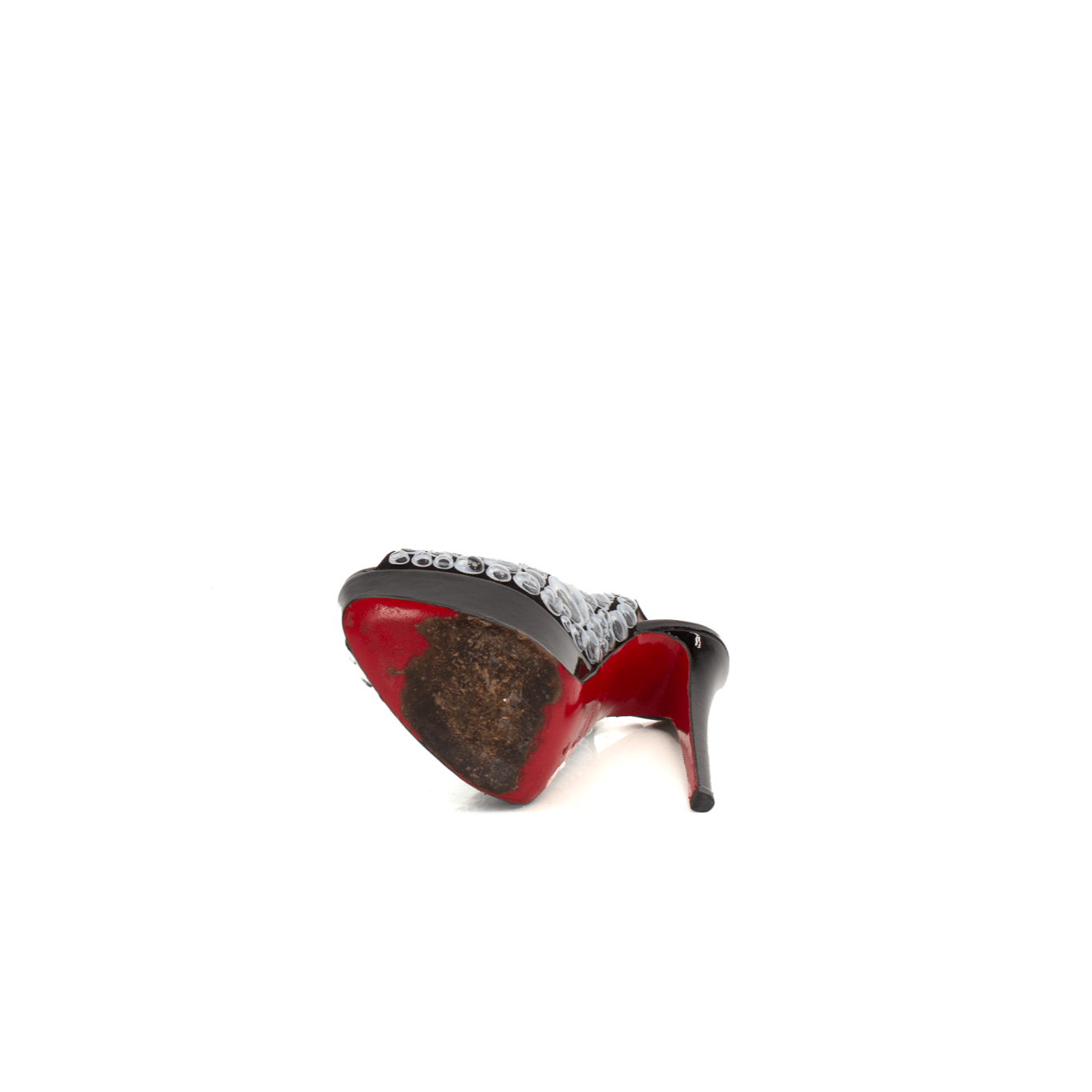 Christian Louboutin Deja Vu 150 platform heels with gold accents and signature red soles, showcased from a side view.