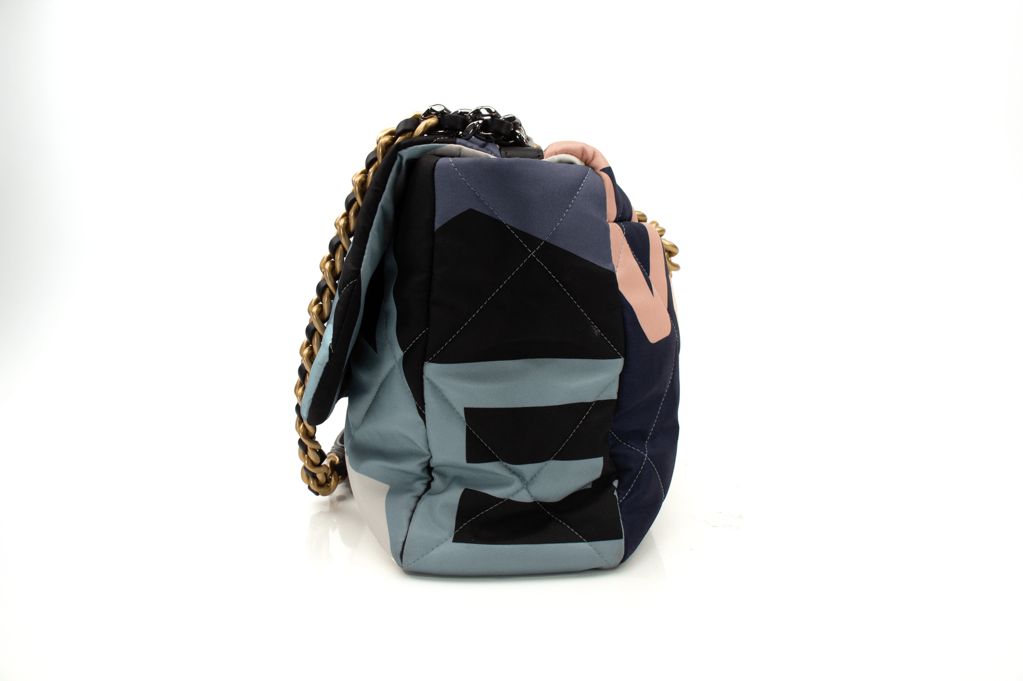 Chanel 19 Silk Flap handbag by Gold & Beyond in elegant silk with a classic flap design and gold hardware accents.