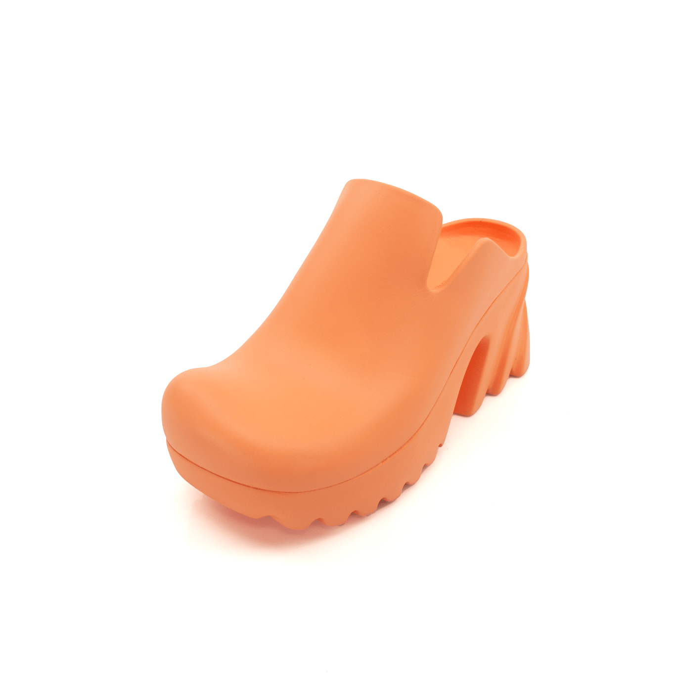 Orange rubber Bottega Veneta clogs shoes with textured sole and slip-on design, displayed on a neutral background.