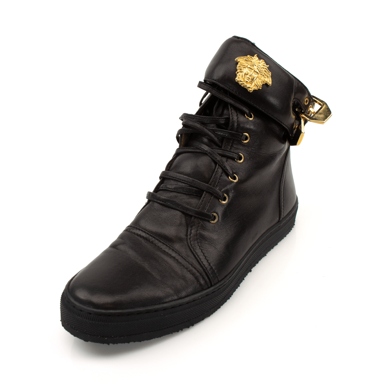 Gold & Beyond Versace Medusa sneakers showing stylish shoes with Medusa logo and modern design in a close-up view.