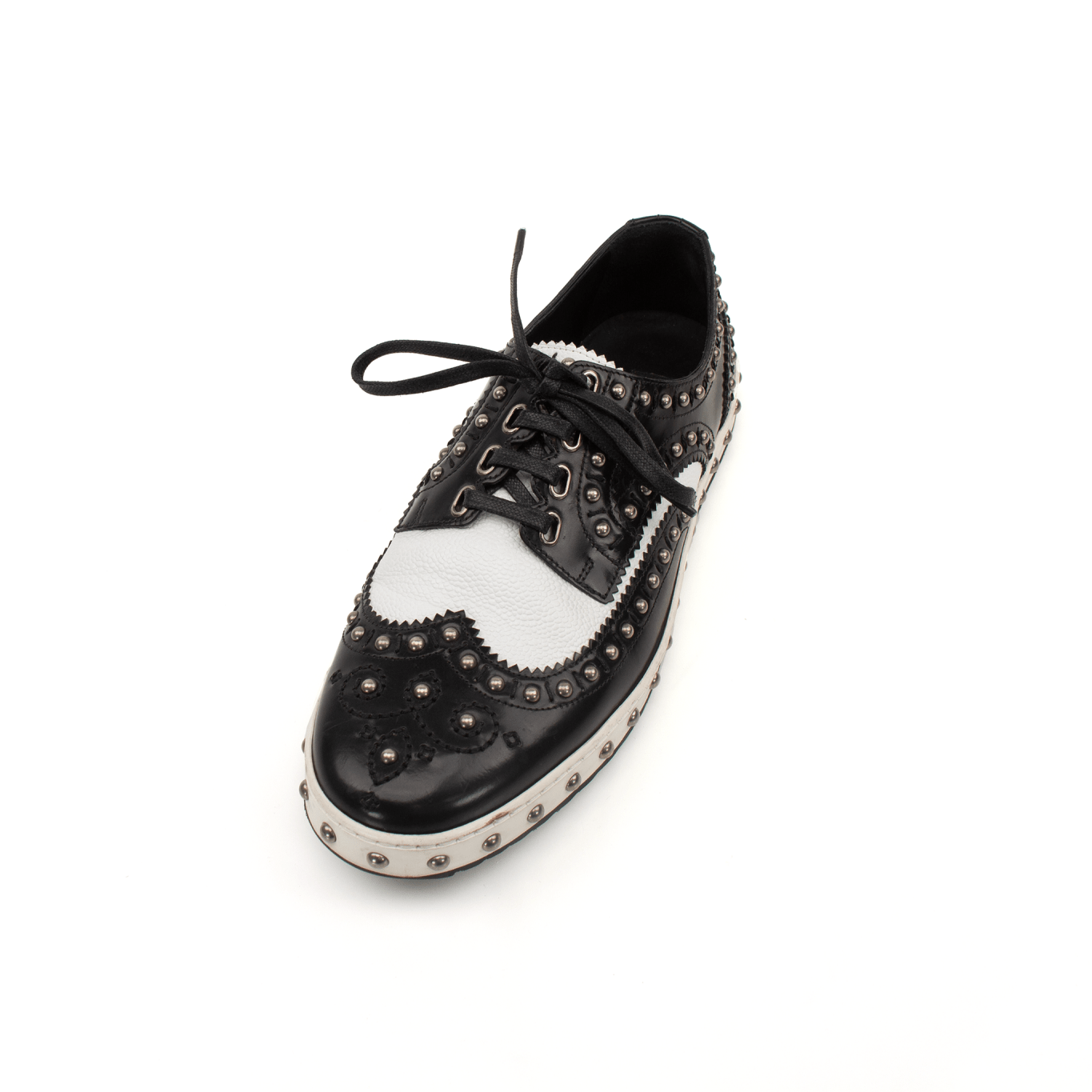 Gold & Beyond Dolce & Gabbana brogue shoes with classic leather detailing and stylish perforations.