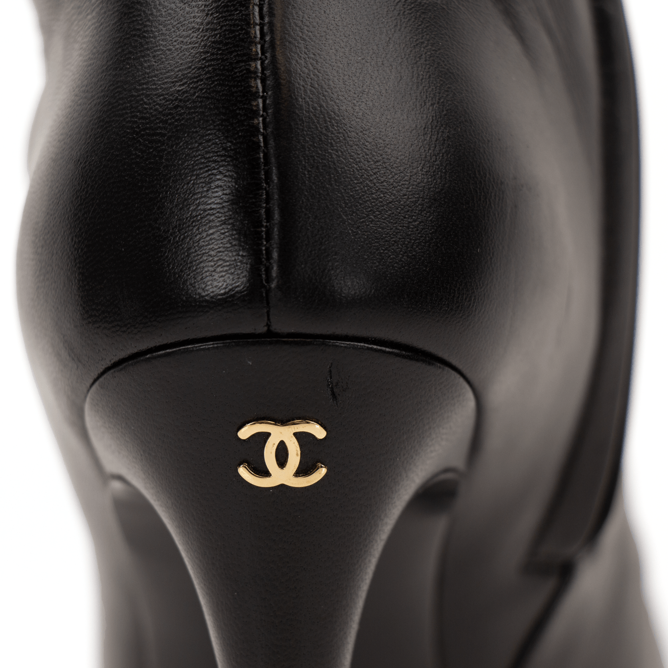 Gold & Beyond Chanel patent leather heels, stylish women's shoes with glossy finish and classic design.