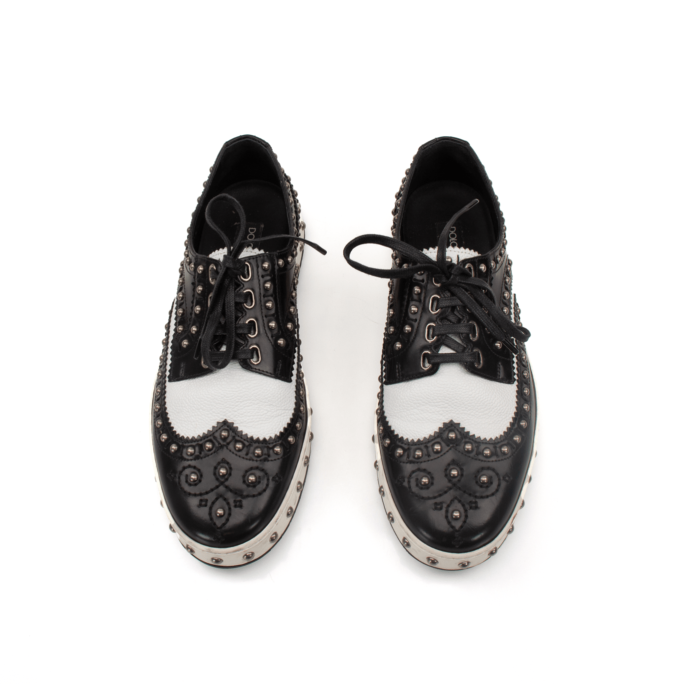 Gold & Beyond Dolce & Gabbana brogue shoes with classic leather design, featuring detailed perforations and sturdy sole.