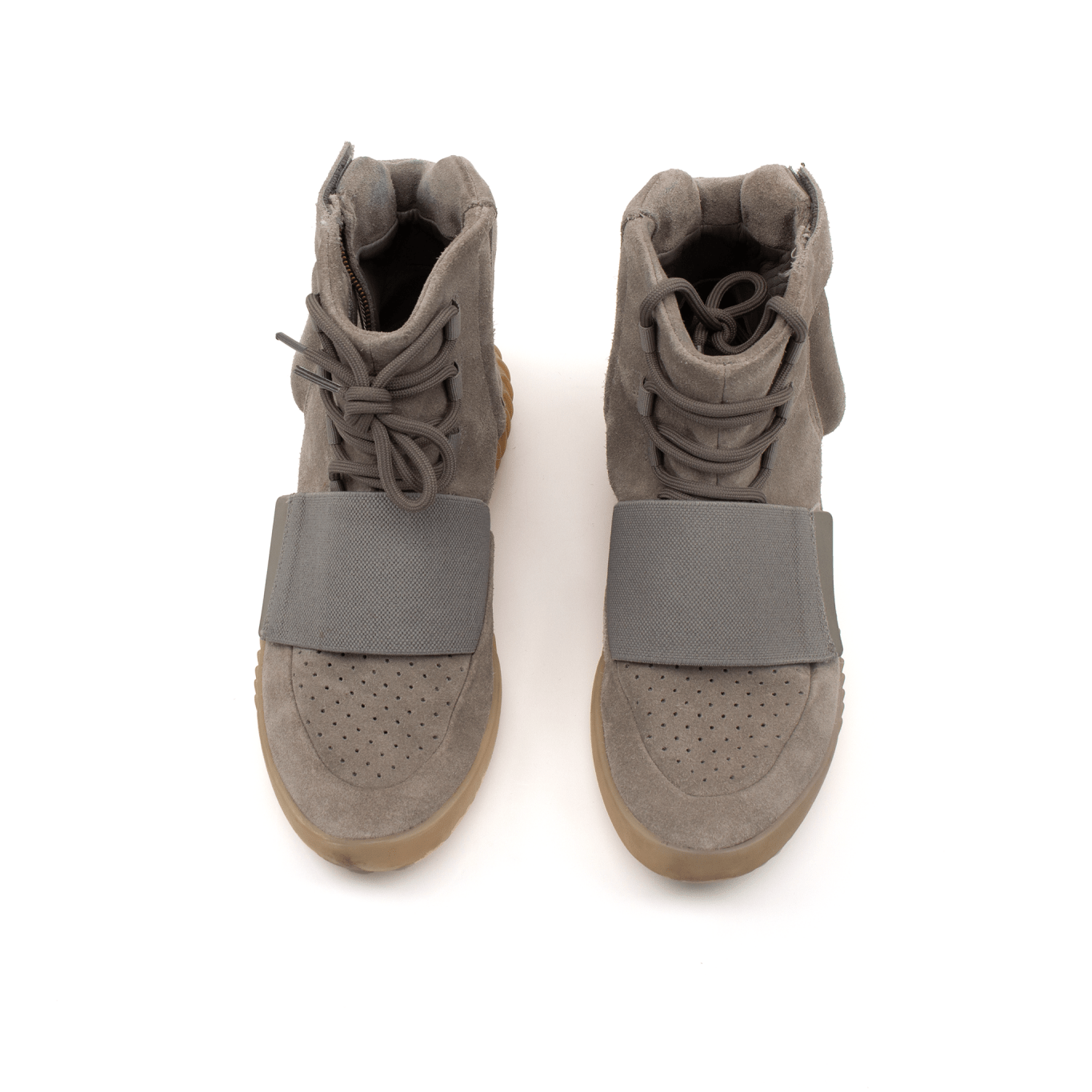 Adidas Yeezy Boost shoes in stylish design, featuring a sleek silhouette and modern detailing, by Gold &amp; Beyond.