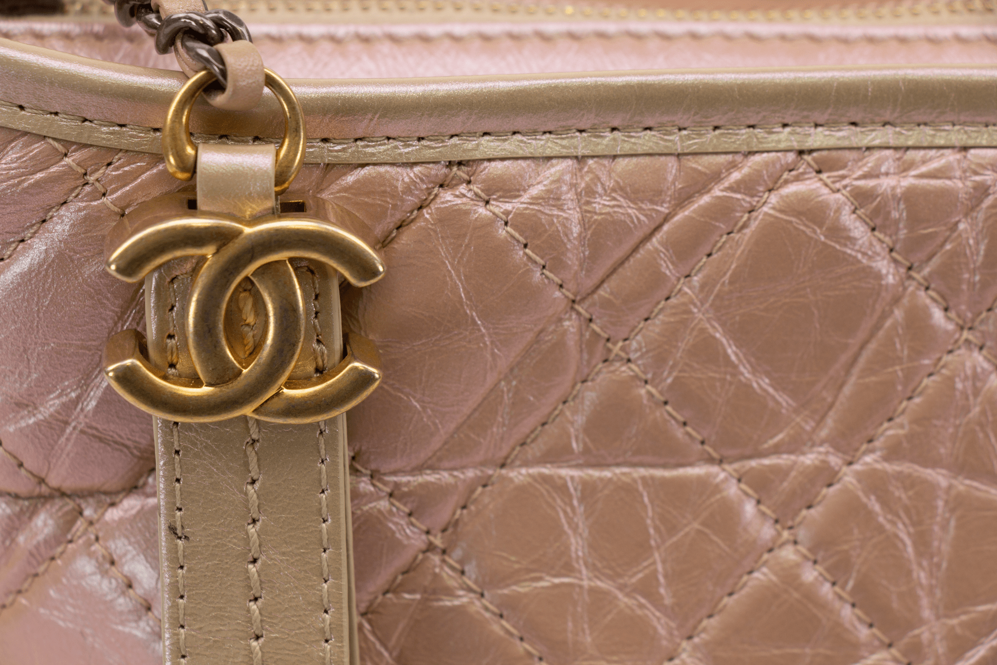 Chanel Gabrielle handbag in elegant design featuring soft leather and gold accents, showcasing a timeless style.