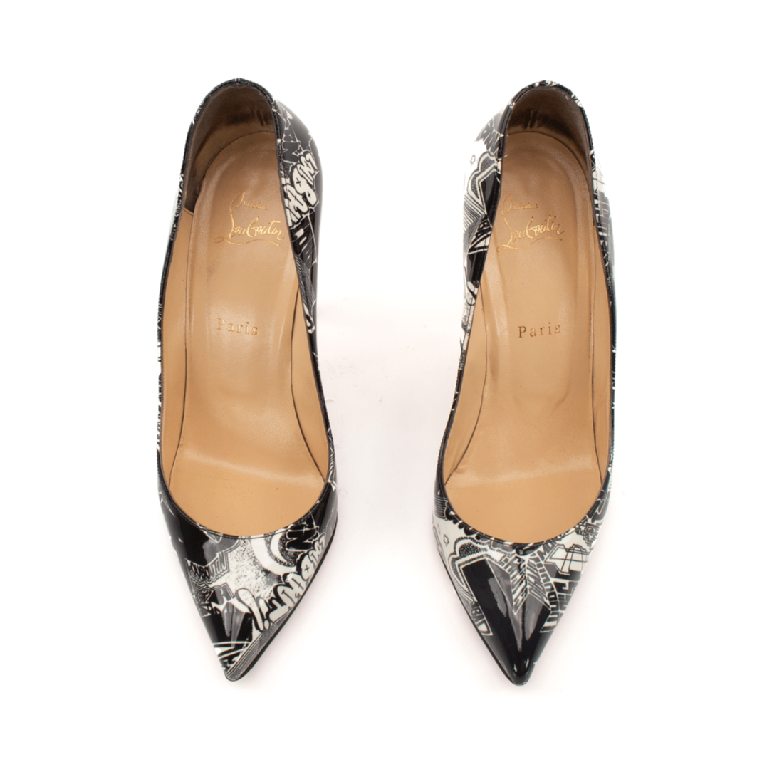 Gold & Beyond Louboutin Graphic heels with bold design, featuring sleek high heels and eye-catching patterns.